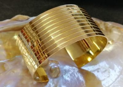 Bracelet manchette en or jaune 750/000